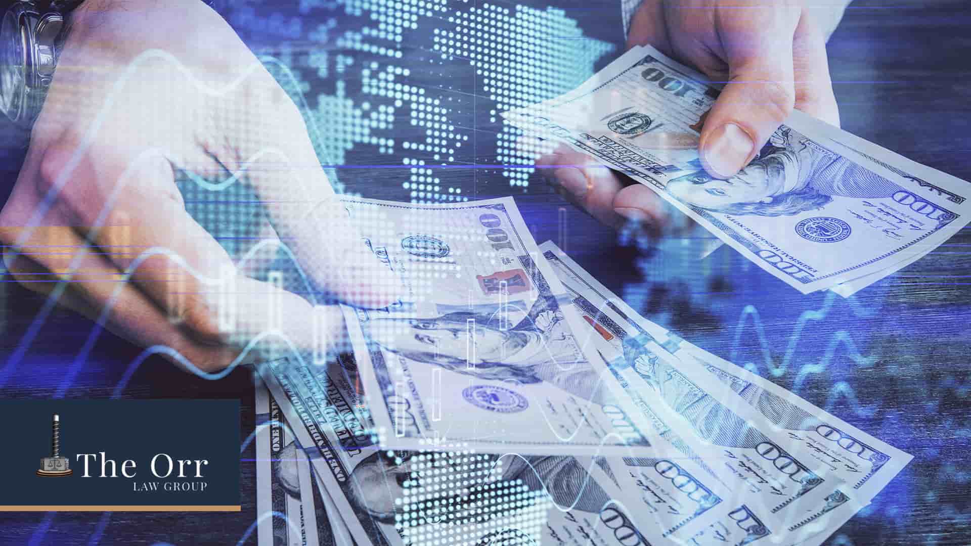 A pair of hands handling money.